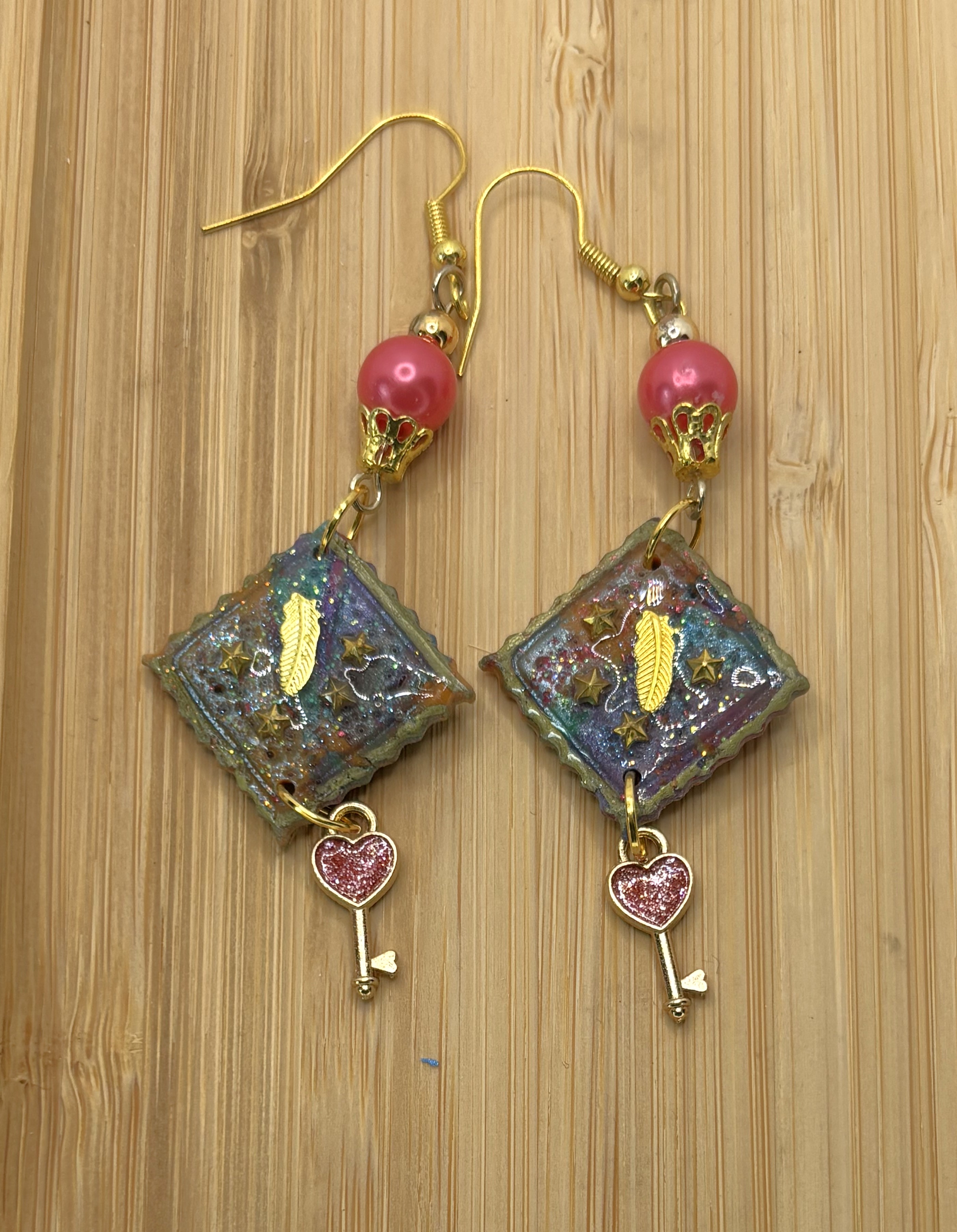 Boucles d'oreilles "secret de plume"TLC4'