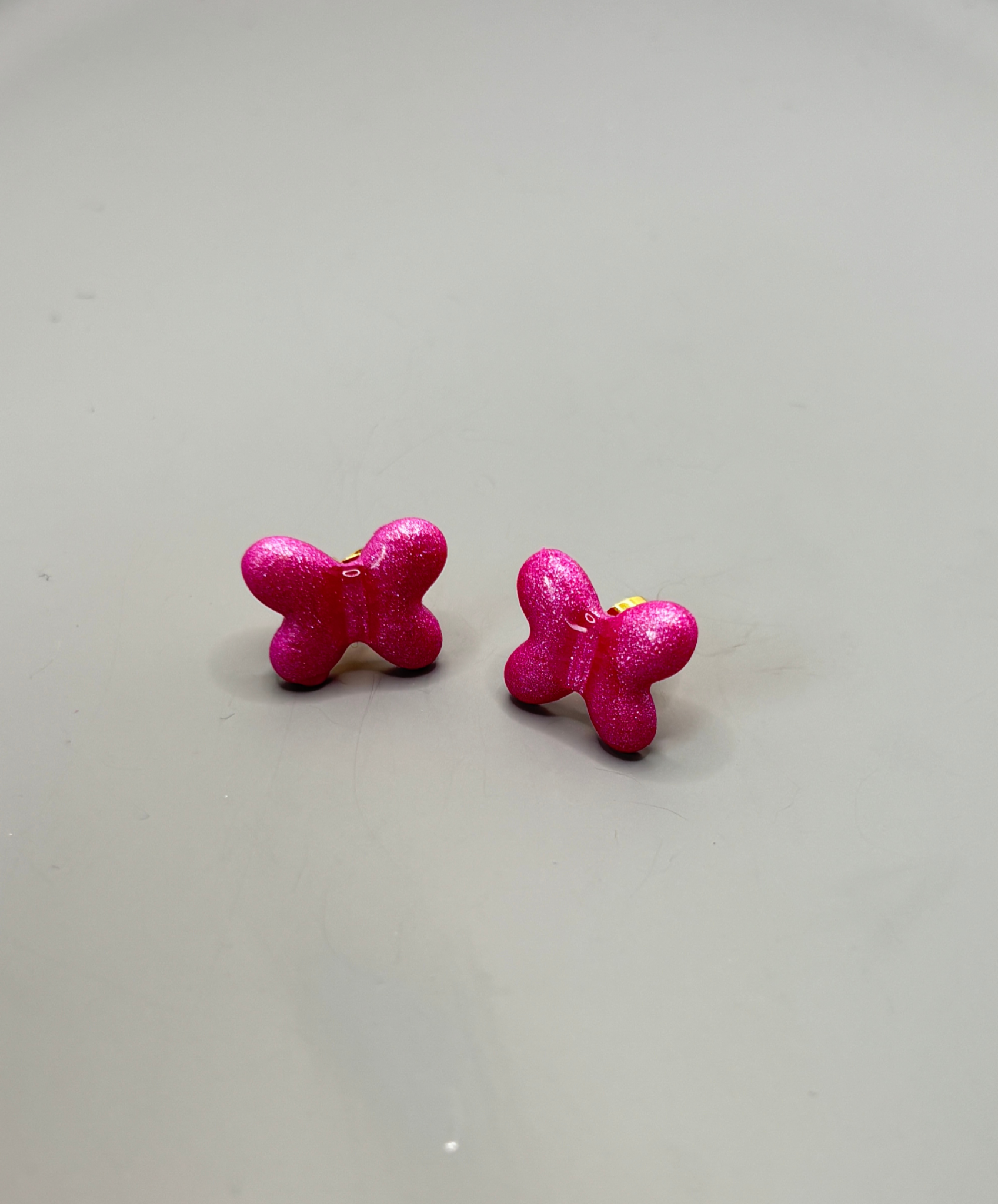 Boucle d'oreille papillon fuschiaPC43